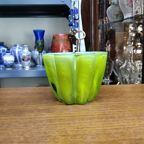 Candlestick made of solid glass in light green with veins like new