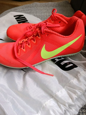 Nike athletic shoes with spikes for track like new, size 39