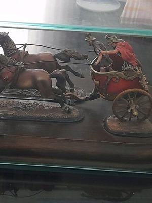 Roman war chariot used with two horses and driver