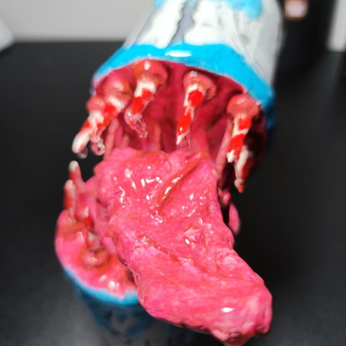 Handmade monster figure from Monster can with clay and UV resin