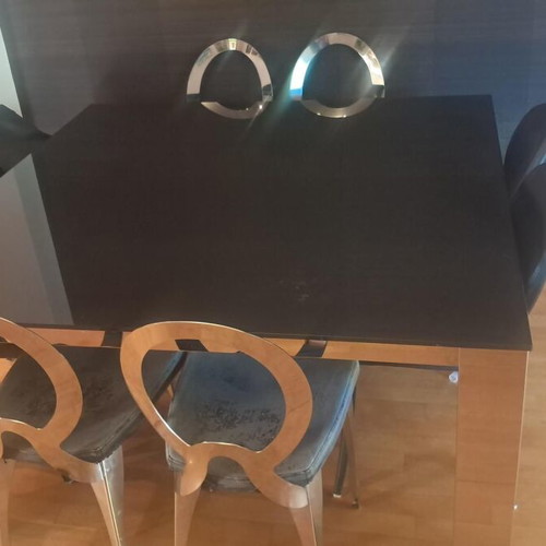 Room table with inox frame and black glass top, like new, with 4 chairs gift