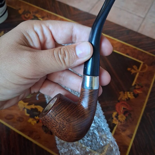 Vintage briar tobacco pipe with metal ring