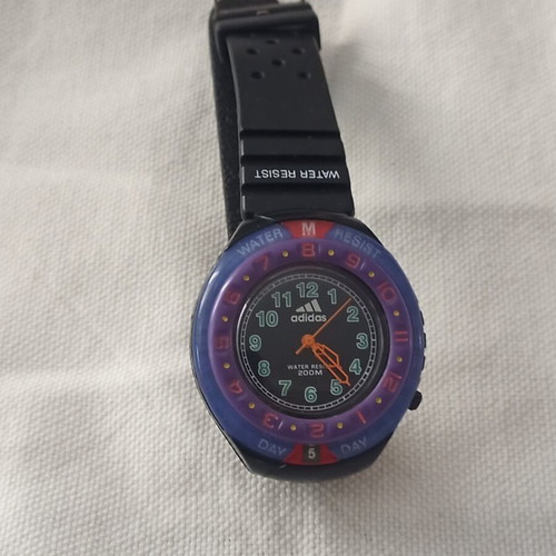 Adidas watch like new with original day and month indicator