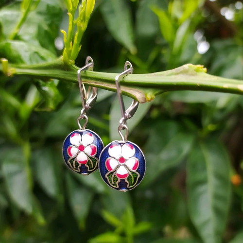 Handmade earrings used with metal elements and enamel