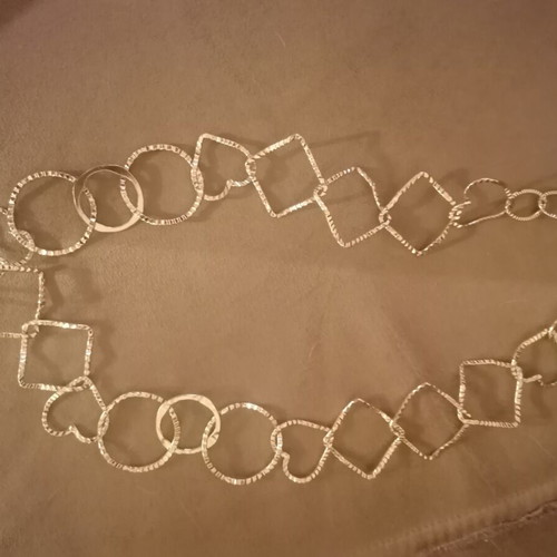 Necklace with circles, squares and hearts, like new