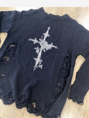 Black distressed sweater with white ornate cross graphic