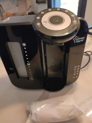 Tommee Tippee Perfect Prep baby milk maker used with new sealed filter