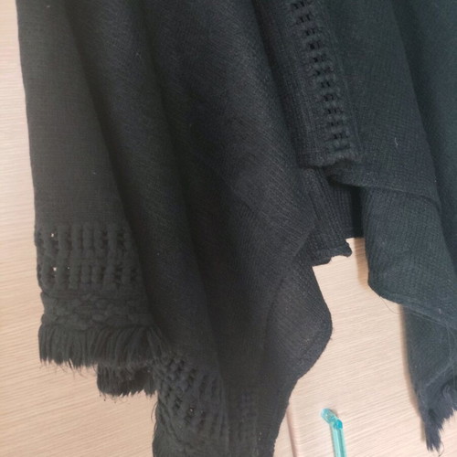 Poncho used black with neck and sleeve pattern