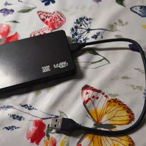 External hard drive enclosure with USB 3.0 Micro B cable