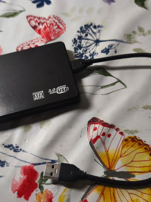 External hard drive enclosure with USB 3.0 Micro B cable