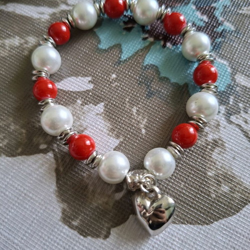 Bracelet with red and white faux pearls and heart pendant used