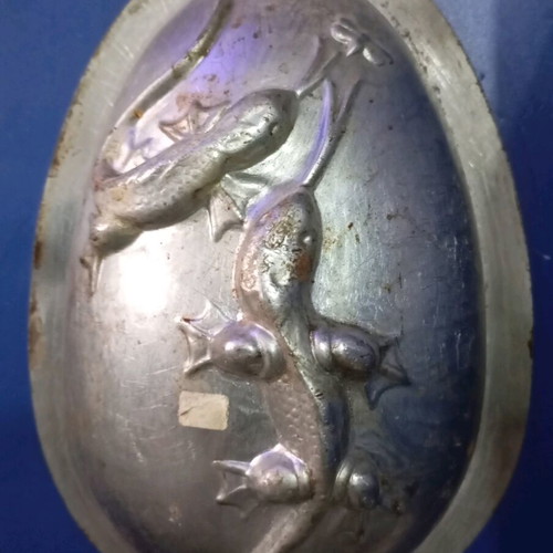 Easter mold used for chocolate egg with children and gifts design