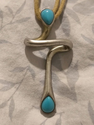 Pendant necklace on beige cord like new