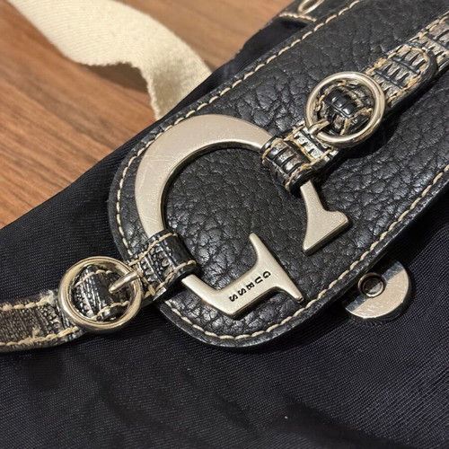Guess women's leather crossbody bag used, waterproof, black and white