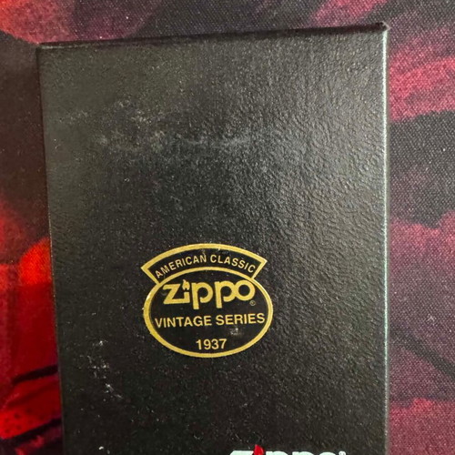Zippo lighter with embossed eagle used