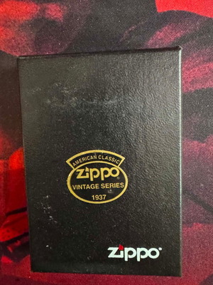Zippo lighter with embossed eagle used