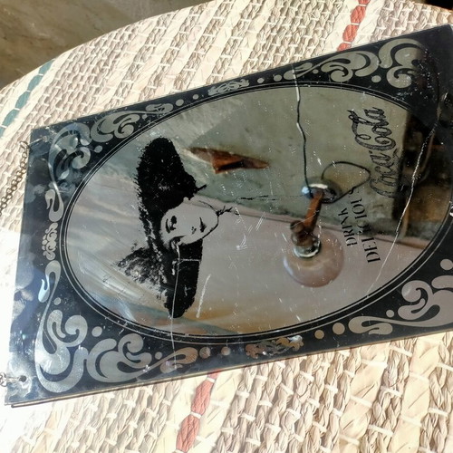 Coca-Cola mirror and picture collection used