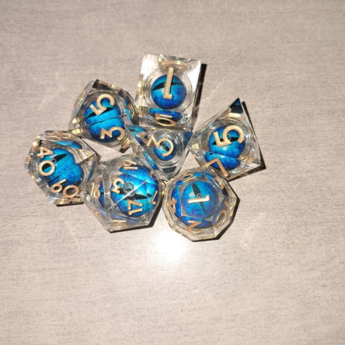 Blue moving dragon eye D&D dice set with bag
