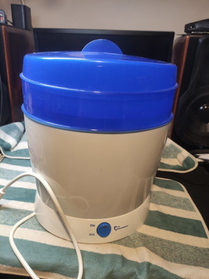 Primamma electric steam sterilizer used, capacity for 9 bottles