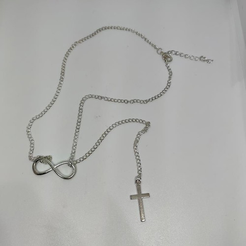 Silver necklace with infinity and cross symbols like new