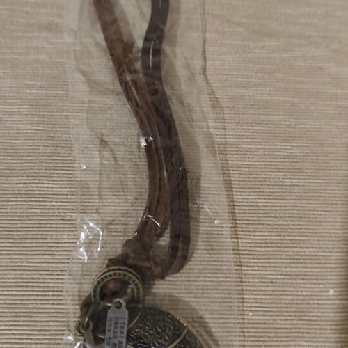 Vintage unisex necklace with leather cord and metal leaf pendant