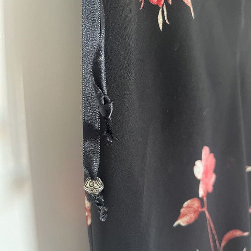 Black floral skirt with transparency medium, used