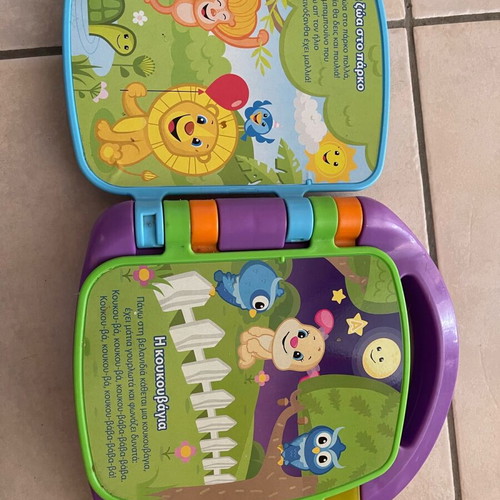 Fisher Price Laugh & Learn educational book like new with music, light and sounds for 6+ months