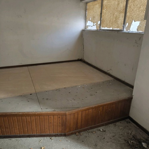 Raised floor used for desk or bed placement
