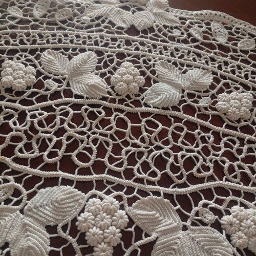 Antique handmade crochet table linen with grape cluster design used