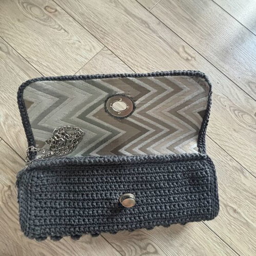Handmade knitted bag with silver strap new