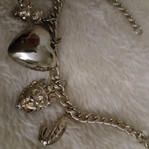 Silver bracelet with charms like new