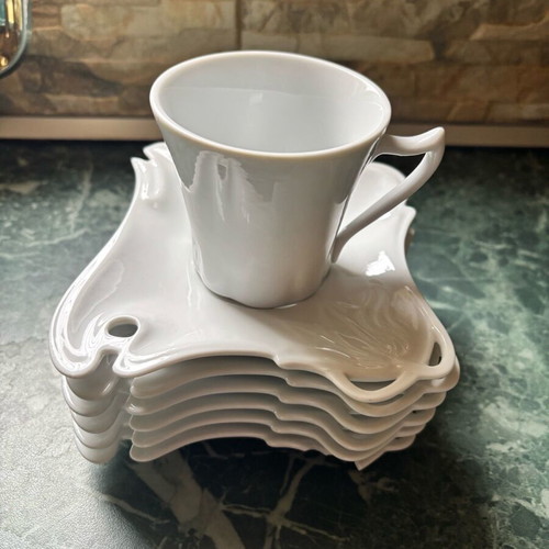 Cups small 6 and large 6 with saucers like new