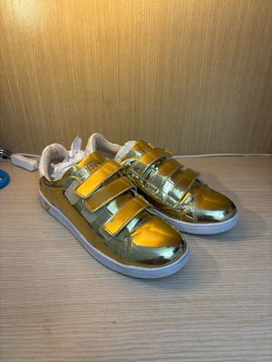 Guess athletic shoes like new, gold color size 39
