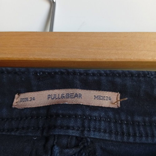 Pull & Bear black skinny jeans like new with front rips and frayed hems
