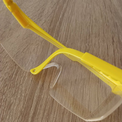 Hilka safety glasses used with adjustment and cord holes