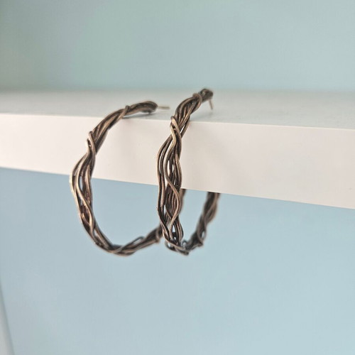 Woven hoop earrings used, bronze by Anna Maria Mazaraki