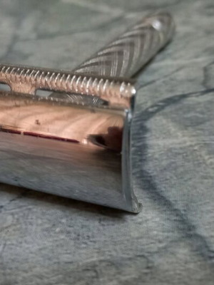 Collectible shaving razor slightly used