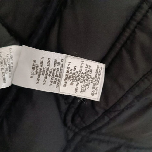 Juicy Couture jacket with down lining size Medium like new, black and white