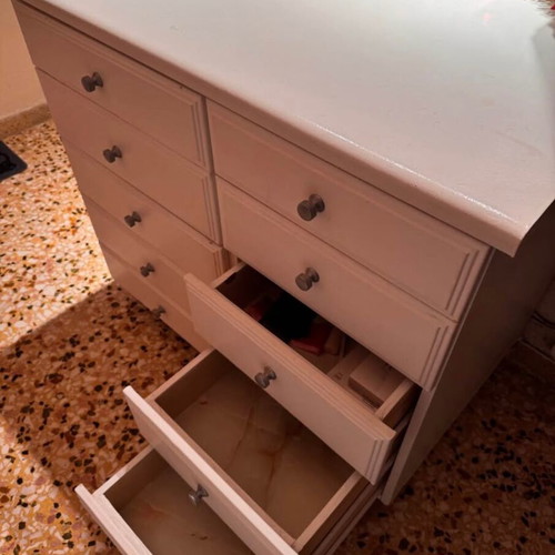 White furniture used with mirror and drawers