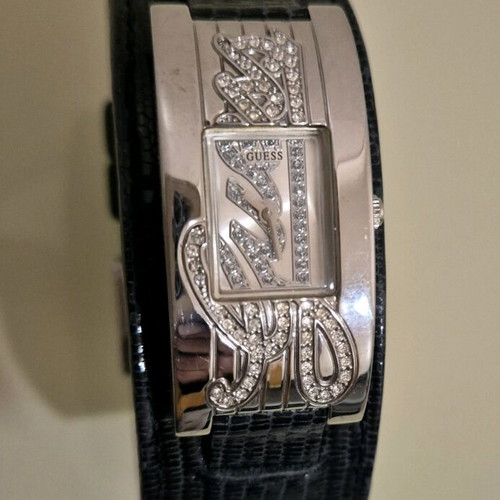 Guess women's cuff watch like new, black leather strap