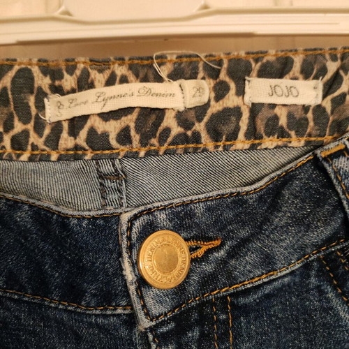 Lynne women's jeans like new with animal print and patches, size L
