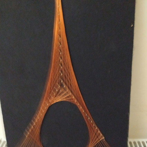 Antique frame with brass pins and wire, Eiffel Tower, used