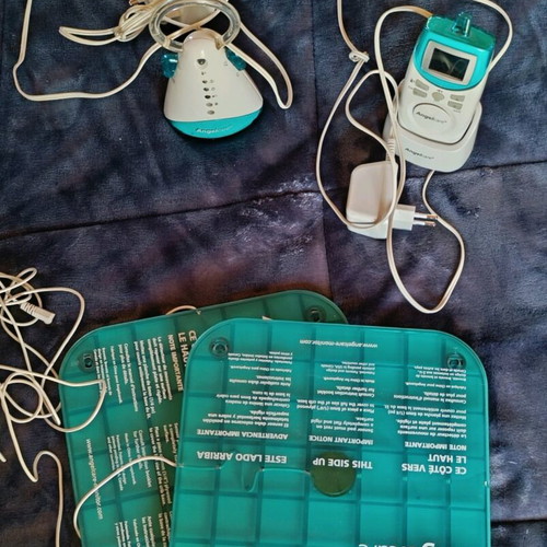 Baby monitor used with sound and movement detection and room temperature display