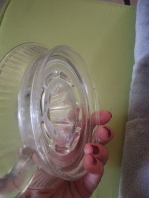 Glass lemon squeezer used