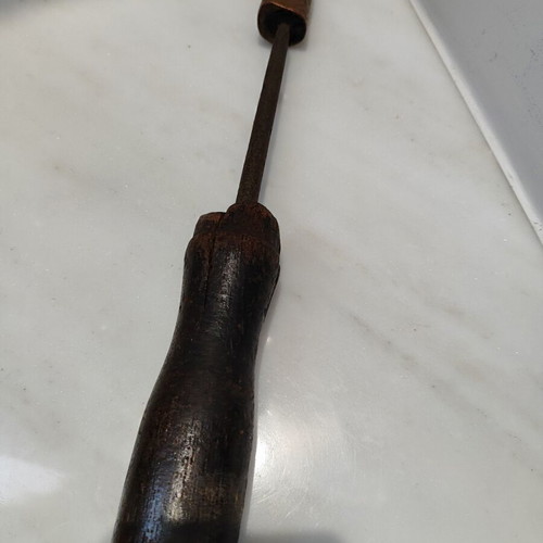Old tool with wooden handle used, 33cm