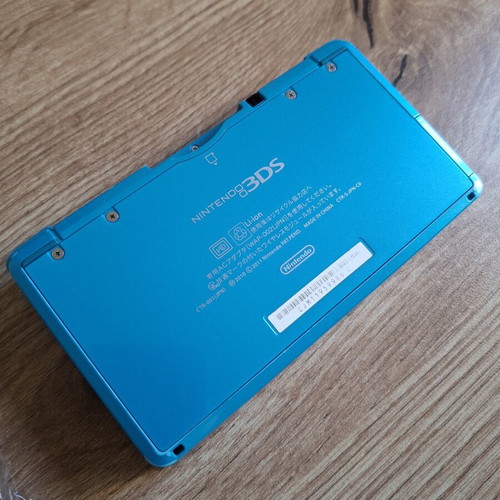 Nintendo 3DS Coral Blue like new with original stylus and USB cable