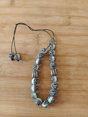 Worry beads white-black with embossed designs like new