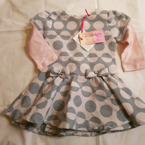 Baby dress new for 12 months with original tag unworn