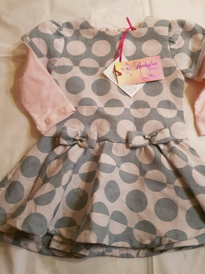 Baby dress new for 12 months with original tag unworn
