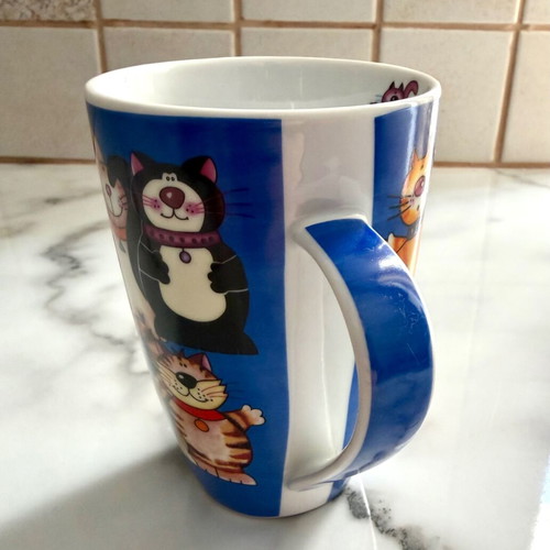 Large porcelain mug with cat design like new